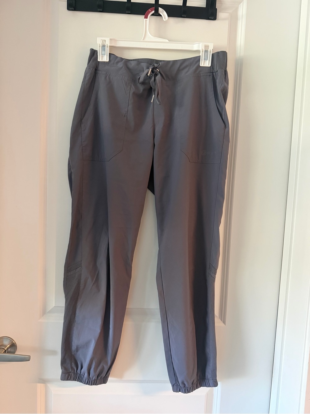 White cross jogger scrubs, women’s medium grey